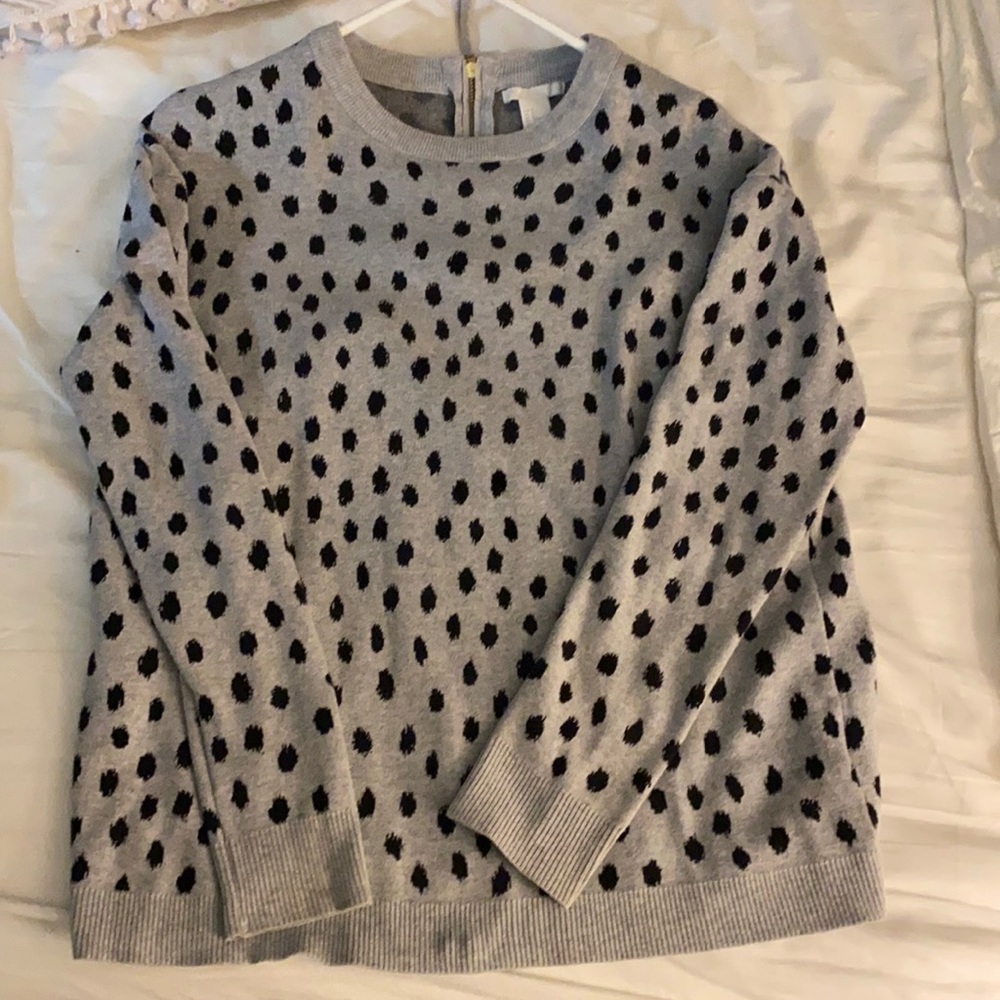 hm dalmatian/cheetah print sweater. zipper detail in the back.